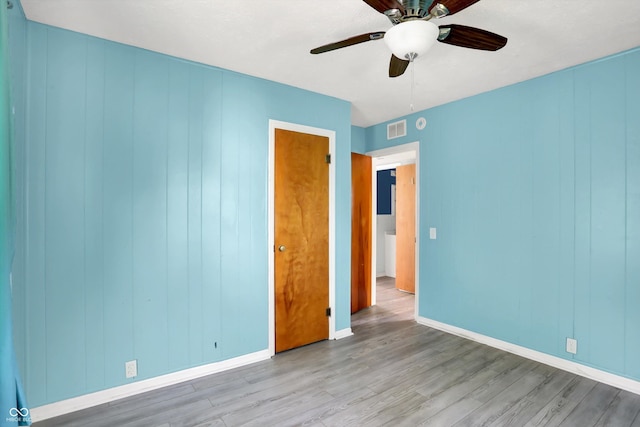 11 14th St, Franklin, IN 46131 - unfurnished room featuring wood finished floors, ceiling fan, and baseboards