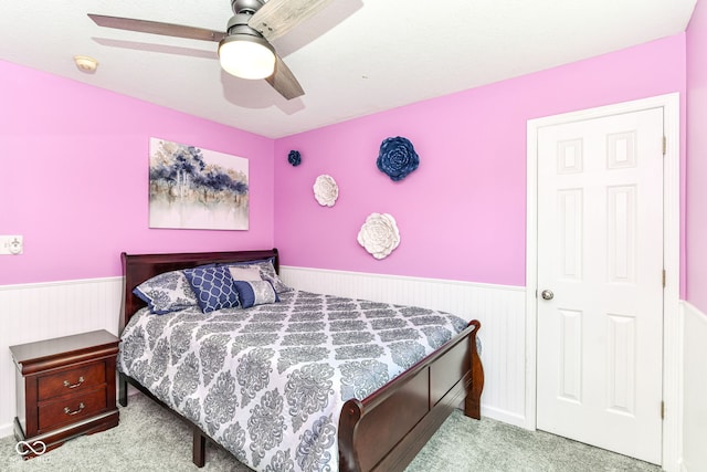 12343 Slate Dr, Fishers, IN 46037 - bedroom with carpet, wainscoting, and a ceiling fan