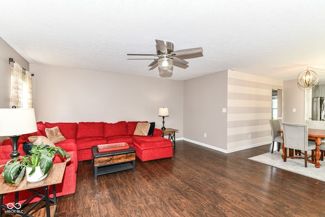 12343 Slate Dr, Fishers, IN 46037 - living area featuring wood finished floors, a chandelier, a ceiling fan, baseboards, and a textured ceiling