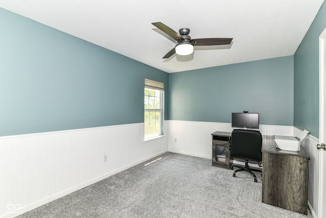 12343 Slate Dr, Fishers, IN 46037 - office featuring a wainscoted wall, ceiling fan, and carpet