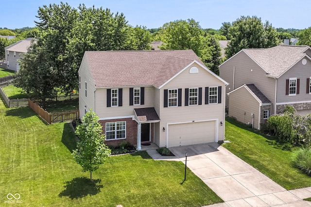 12343 Slate Dr, Fishers, IN 46037 - traditional-style home featuring an attached garage, driveway, roof with shingles, and brick siding