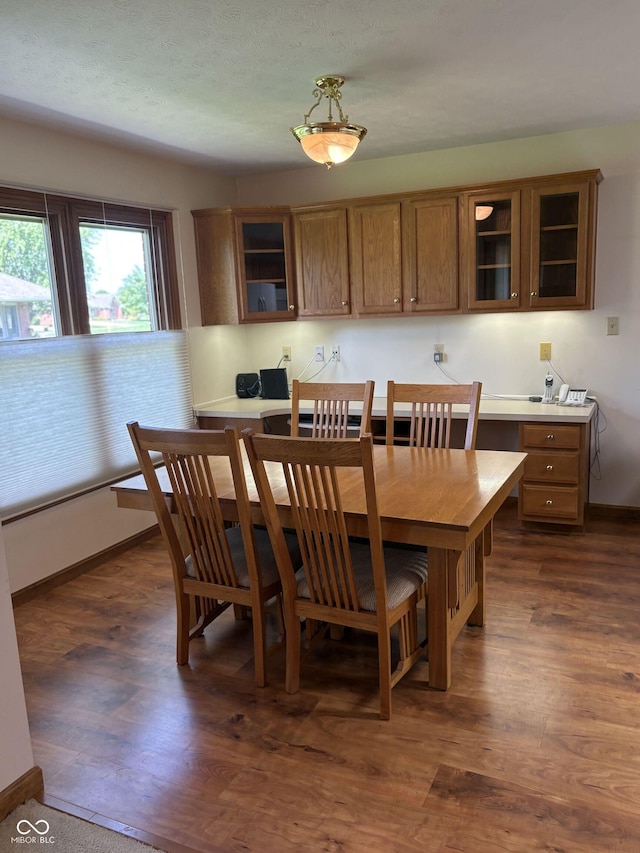 5148 Constitution Ct, Columbus, IN 47203 - dining space with dark wood-style flooring and baseboards