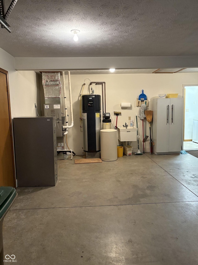 5148 Constitution Ct, Columbus, IN 47203 - garage featuring water heater and freestanding refrigerator