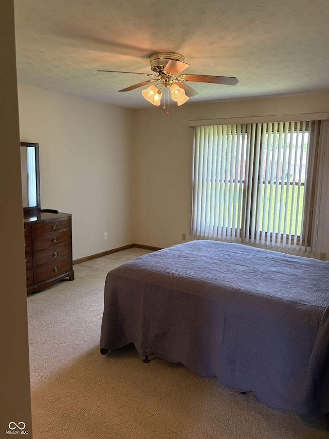 5148 Constitution Ct, Columbus, IN 47203 - carpeted bedroom with ceiling fan and baseboards