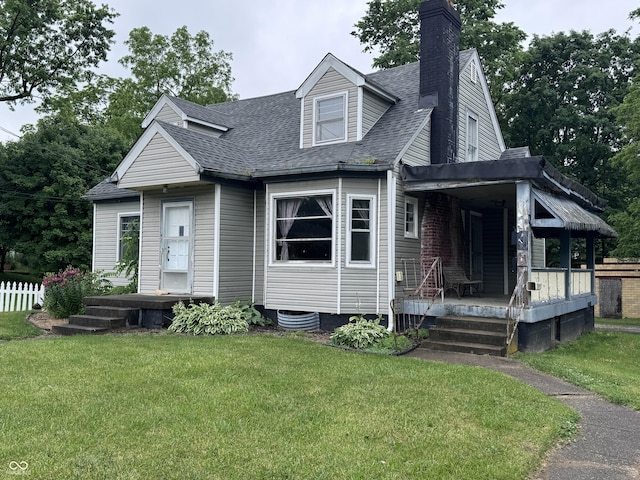 114 S Green St, Brownsburg, IN 46112 - new england style home with covered porch, a chimney, and roof with shingles
