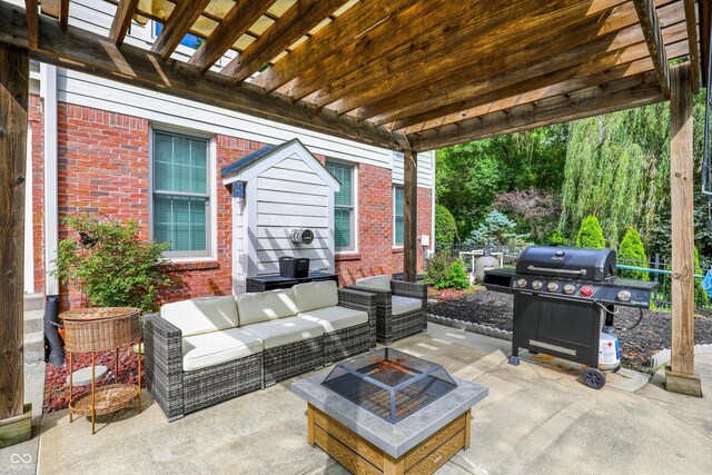 4075 Dartmoor Dr, Greenwood, IN 46143 - view of patio / terrace with area for grilling, an outdoor living space with a fire pit, and a pergola
