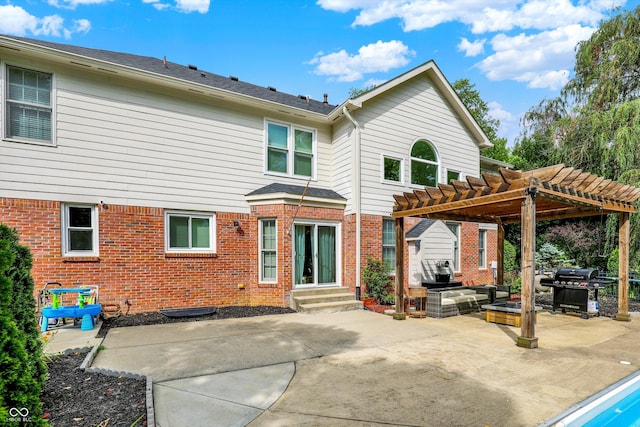 4075 Dartmoor Dr, Greenwood, IN 46143 - back of property featuring a patio, a pergola, brick siding, entry steps, and an outdoor hangout area
