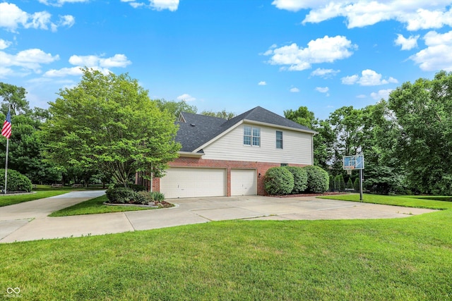 4075 Dartmoor Dr, Greenwood, IN 46143 - view of home's exterior with brick siding, driveway, a lawn, and an attached garage