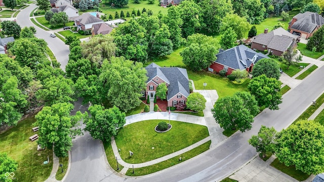 4075 Dartmoor Dr, Greenwood, IN 46143 - aerial view of residential area with a tree filled landscape