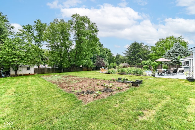 164 Wellington Pkwy, Noblesville, IN 46060 - view of yard featuring a patio area and view of scattered trees