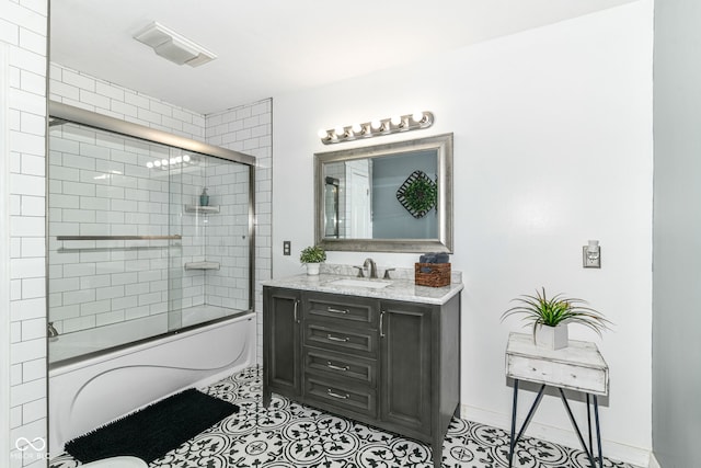 164 Wellington Pkwy, Noblesville, IN 46060 - full bath with vanity, bath / shower combo with glass door, tile patterned flooring, and baseboards