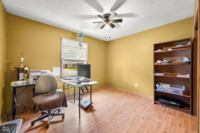 3210 Flintwood Dr, Columbus, IN 47203 - office area featuring ceiling fan, wood finished floors, a textured ceiling, and baseboards