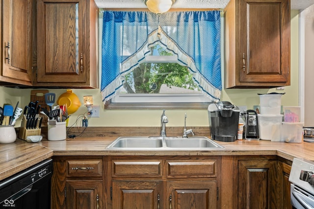 3210 Flintwood Dr, Columbus, IN 47203 - kitchen with dishwasher, a sink, stove, and brown cabinets