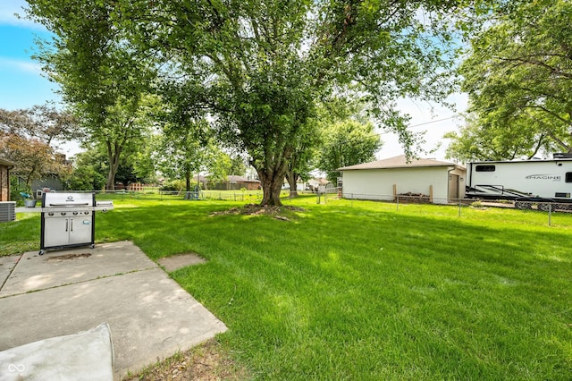 3210 Flintwood Dr, Columbus, IN 47203 - view of yard with a patio area and central air condition unit