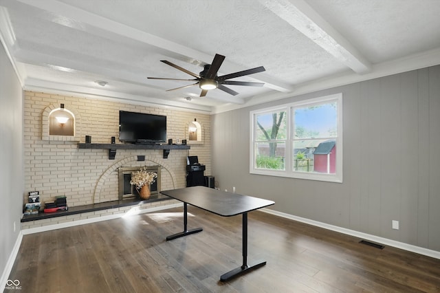 8635 Bishops Ln, Indianapolis, IN 46217 - office space featuring beamed ceiling, a fireplace, baseboards, wood finished floors, and a ceiling fan