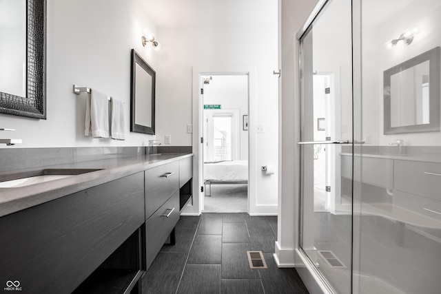 1622 Cornell Ave, Indianapolis, IN 46202 - full bath featuring double vanity, a shower stall, and ensuite bath