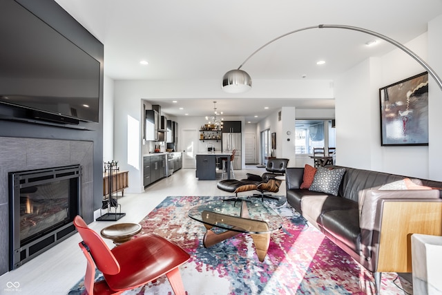 1622 Cornell Ave, Indianapolis, IN 46202 - living room with a chandelier, recessed lighting, and a large fireplace