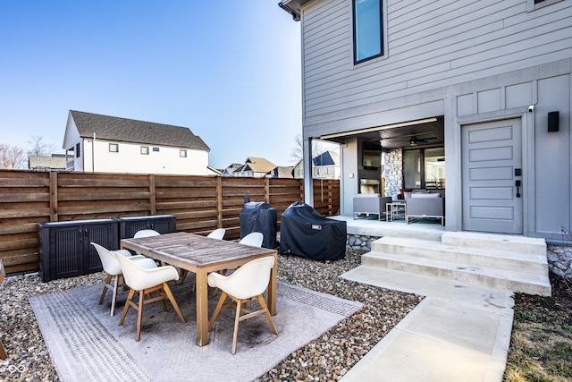 1622 Cornell Ave, Indianapolis, IN 46202 - fenced backyard with outdoor dining area and a patio