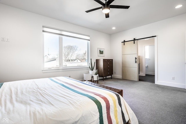 1622 Cornell Ave, Indianapolis, IN 46202 - bedroom with a barn door, carpet floors, multiple windows, recessed lighting, and ceiling fan