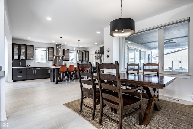 1622 Cornell Ave, Indianapolis, IN 46202 - dining space featuring light wood finished floors and recessed lighting