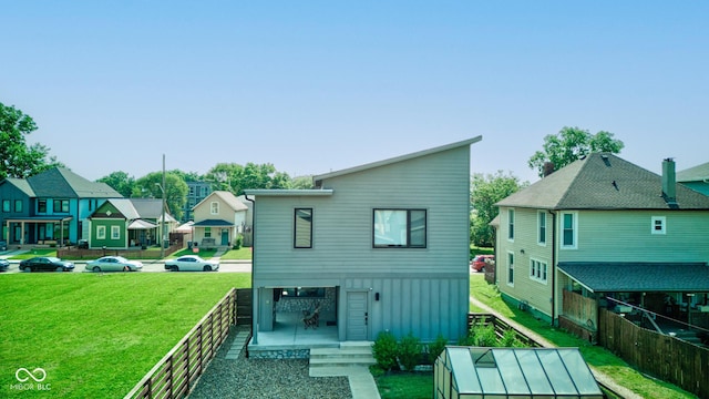 1622 Cornell Ave, Indianapolis, IN 46202 - rear view of property with a fenced backyard and a residential view
