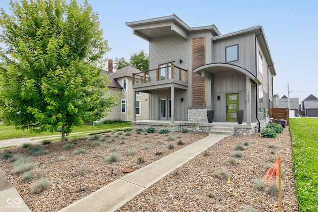 1622 Cornell Ave, Indianapolis, IN 46202 - modern home with a balcony and board and batten siding