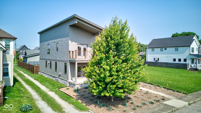 1622 Cornell Ave, Indianapolis, IN 46202 - view of side of home featuring a balcony and a residential view
