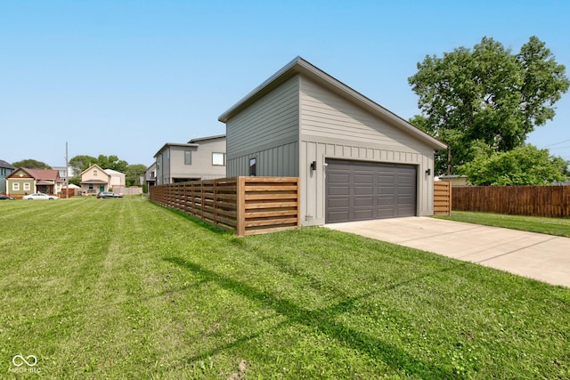 1622 Cornell Ave, Indianapolis, IN 46202 - view of side of home with a garage and board and batten siding
