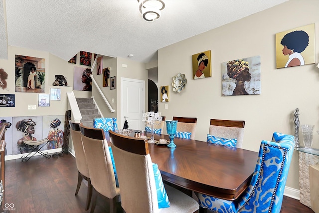 9605 Treyburn Green Way, Indianapolis, IN 46239 - dining space with arched walkways, wood finished floors, stairway, and a textured ceiling