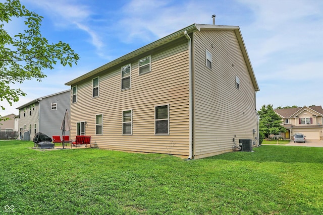 9605 Treyburn Green Way, Indianapolis, IN 46239 - back of property with a lawn