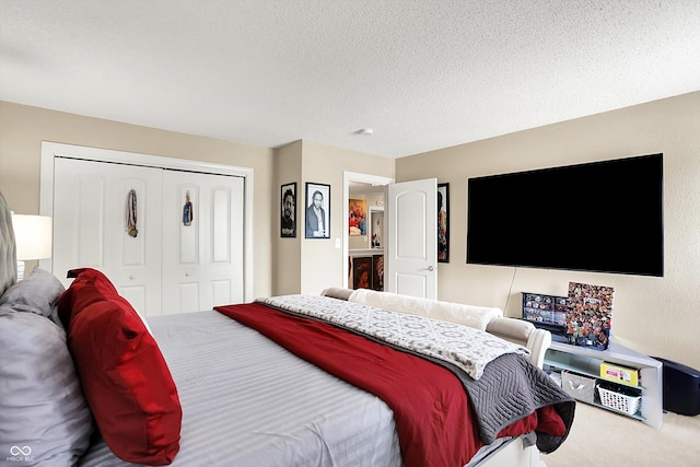 9605 Treyburn Green Way, Indianapolis, IN 46239 - bedroom with a closet, carpet floors, and a textured ceiling