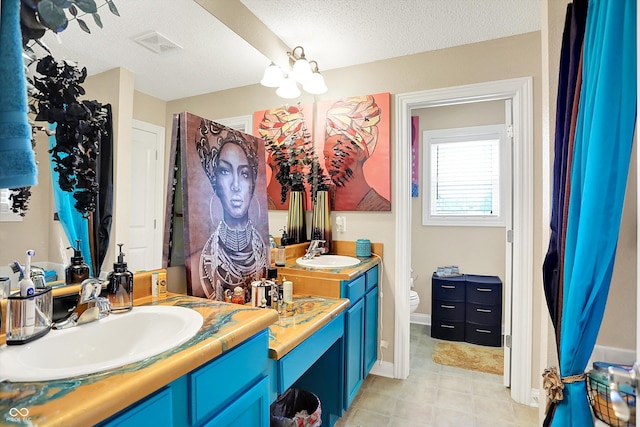 9605 Treyburn Green Way, Indianapolis, IN 46239 - full bath with vanity and a textured ceiling