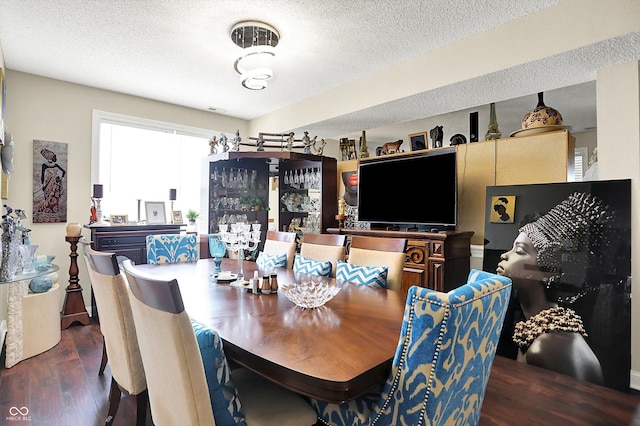 9605 Treyburn Green Way, Indianapolis, IN 46239 - dining area featuring wood finished floors and a textured ceiling