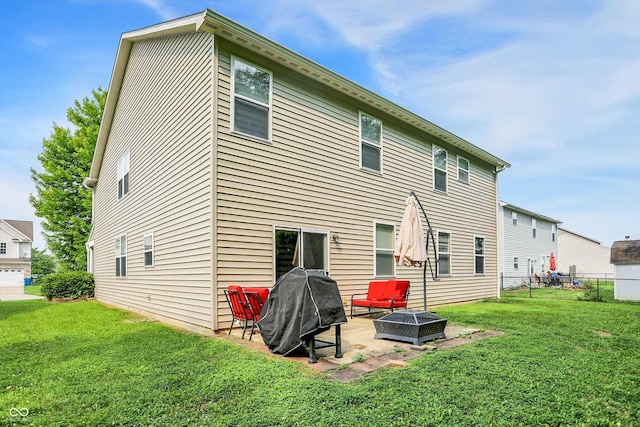 9605 Treyburn Green Way, Indianapolis, IN 46239 - back of house featuring an outdoor hangout area