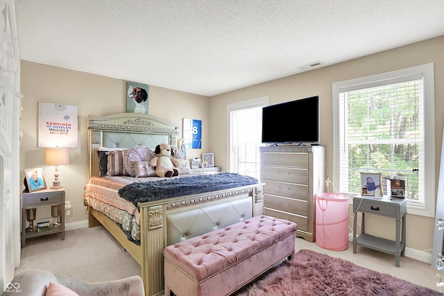 9605 Treyburn Green Way, Indianapolis, IN 46239 - bedroom with light carpet and a textured ceiling
