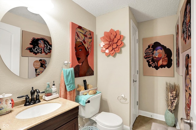 9605 Treyburn Green Way, Indianapolis, IN 46239 - bathroom with vanity, a textured ceiling, and tile patterned flooring