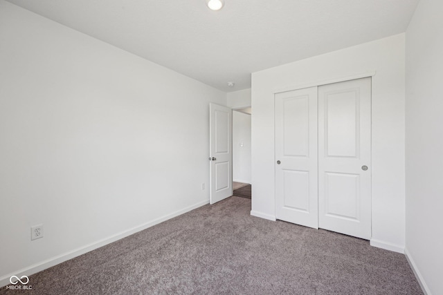 1304 Vera Blvd, Danville, IN 46122 - unfurnished bedroom with carpet flooring, baseboards, and a closet