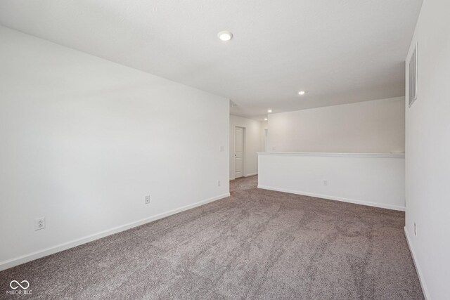 1304 Vera Blvd, Danville, IN 46122 - carpeted empty room with baseboards and recessed lighting