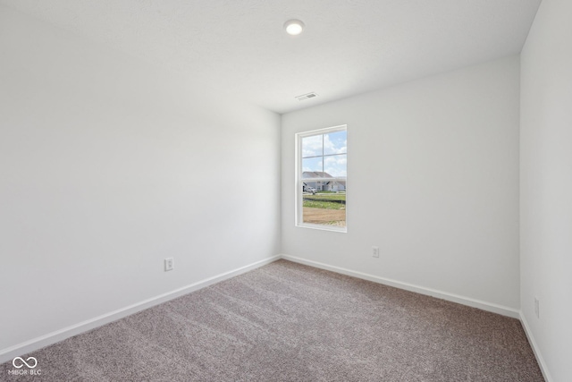 1304 Vera Blvd, Danville, IN 46122 - empty room with carpet flooring and baseboards
