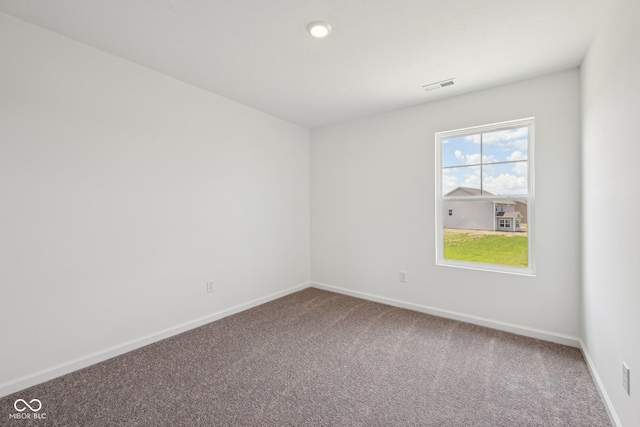 1304 Vera Blvd, Danville, IN 46122 - spare room with carpet floors and baseboards