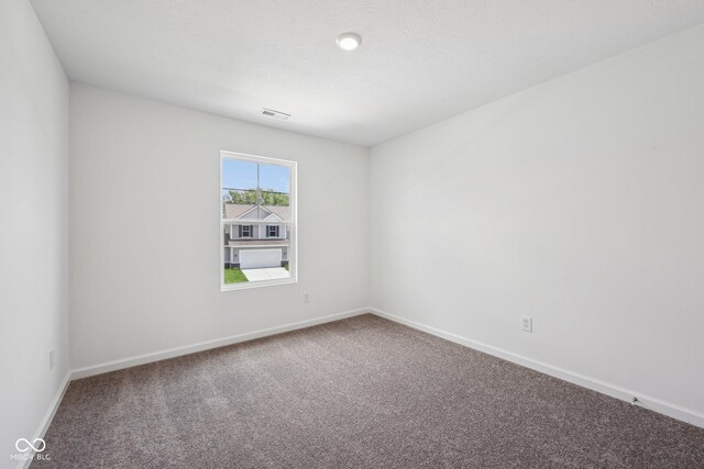 1304 Vera Blvd, Danville, IN 46122 - carpeted spare room with baseboards