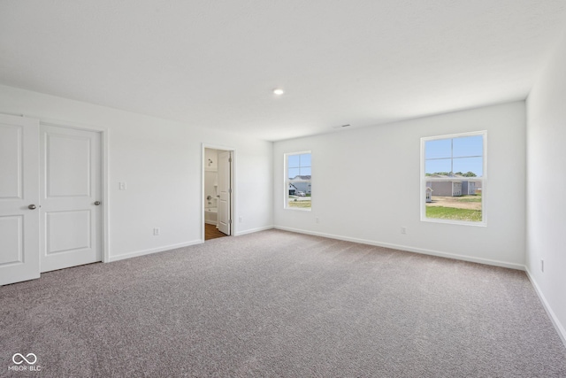 1304 Vera Blvd, Danville, IN 46122 - unfurnished bedroom featuring carpet flooring, baseboards, and ensuite bathroom