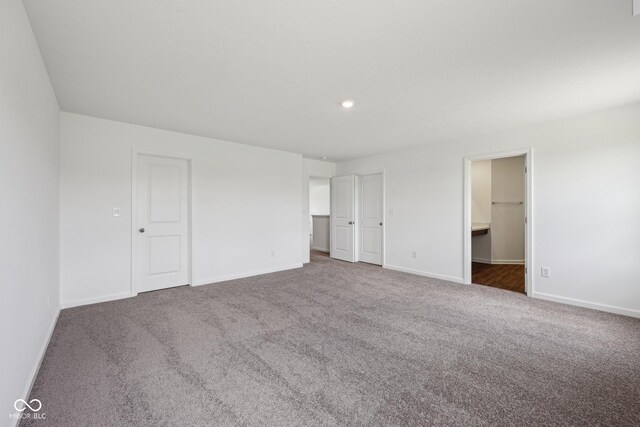 1304 Vera Blvd, Danville, IN 46122 - unfurnished bedroom featuring carpet floors, baseboards, and recessed lighting