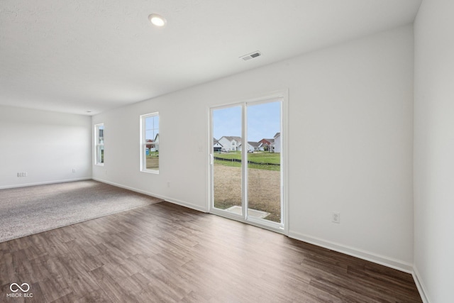 1304 Vera Blvd, Danville, IN 46122 - empty room featuring dark wood-style floors and baseboards