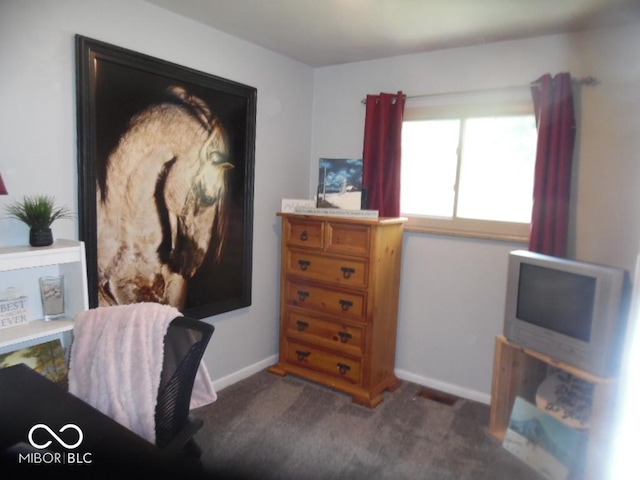 213 S Coventry Dr, Anderson, IN 46012 - sitting room featuring baseboards and dark carpet
