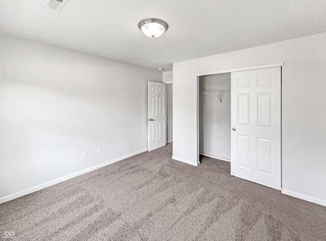 10112 James Run Dr, Indianapolis, IN 46239 - unfurnished bedroom with carpet flooring, baseboards, and a closet