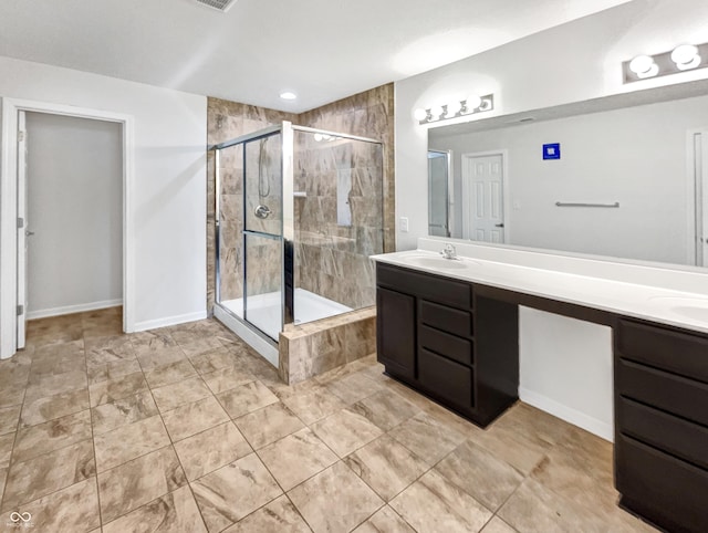 10112 James Run Dr, Indianapolis, IN 46239 - full bathroom featuring double vanity, a stall shower, and baseboards