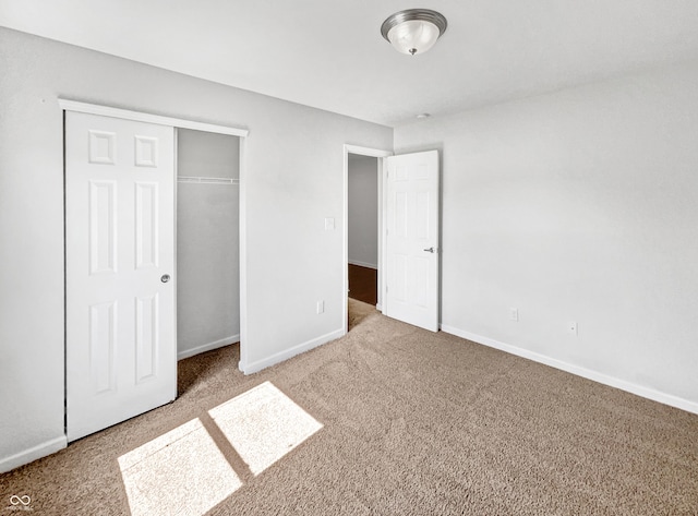 10112 James Run Dr, Indianapolis, IN 46239 - unfurnished bedroom featuring carpet, baseboards, and a closet
