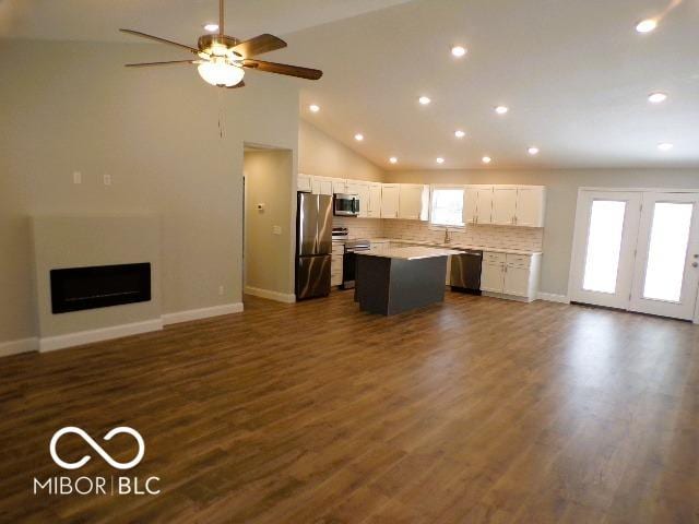 3204 N County Road 900 E, Seymour, IN 47274 - kitchen with stainless steel appliances, open floor plan, a kitchen island, white cabinetry, and recessed lighting