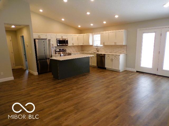3204 N County Road 900 E, Seymour, IN 47274 - kitchen featuring appliances with stainless steel finishes, tasteful backsplash, a sink, a center island, and recessed lighting